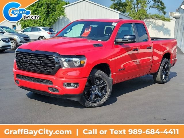 2023 RAM 1500 Big Horn Quad Cab 4x4 6'4" Box in Red — front three-quarter view