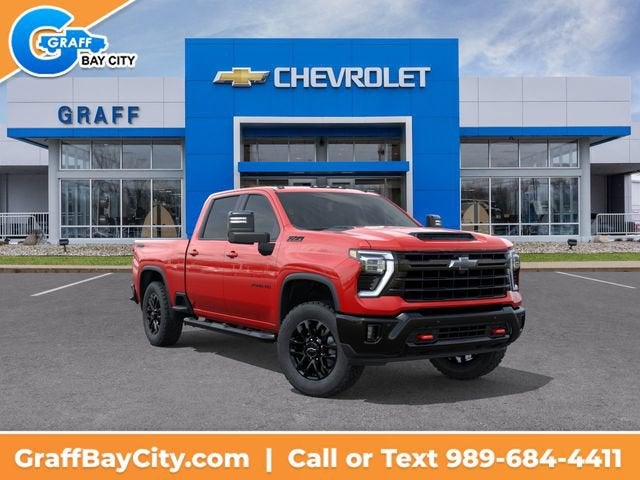2026 Chevrolet Silverado 2500 HD LT in Red Hot — front three-quarter view