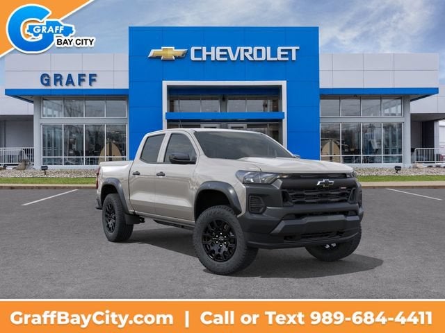 2026 Chevrolet Colorado Trail Boss in White Sands — front three-quarter view
