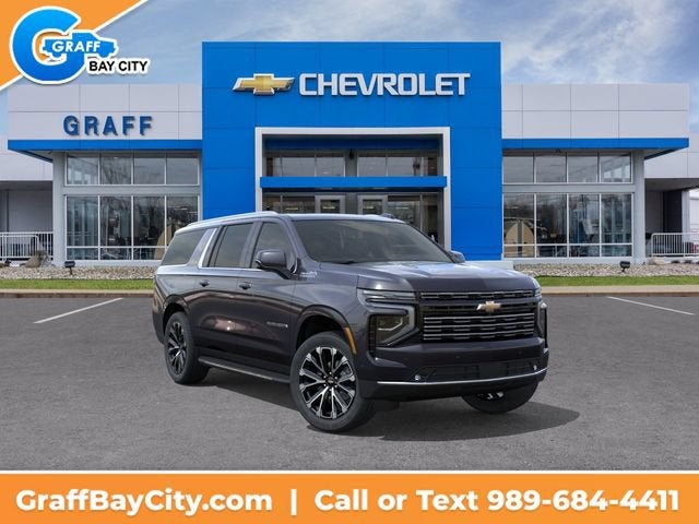 2026 Chevrolet Suburban High Country in Dark Ash Metallic — front three-quarter view