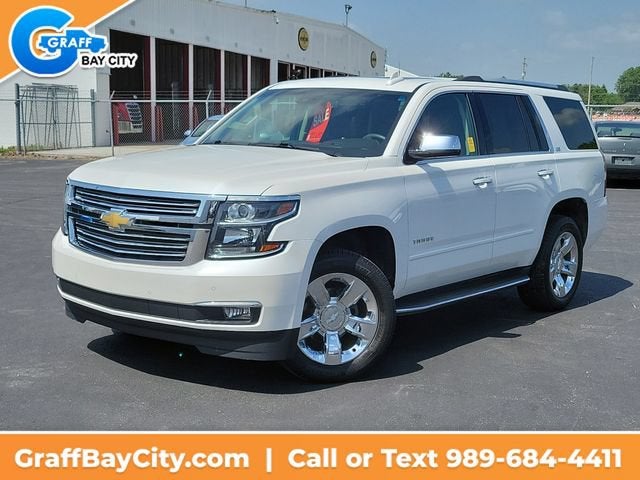 2016 Chevrolet Tahoe LTZ in Iridescent Pearl Tricoat — front three-quarter view