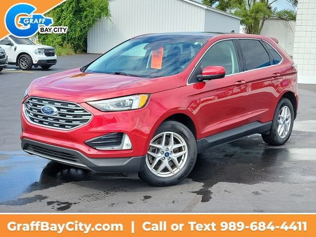 2021 Ford Edge SEL in Red — front three-quarter view