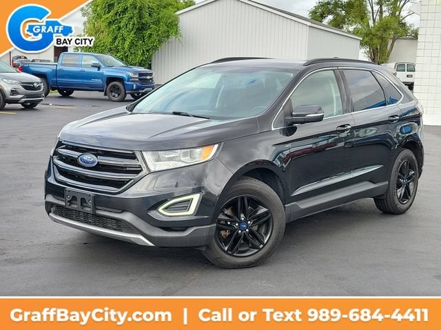 2015 Ford Edge SEL in Black — front three-quarter view
