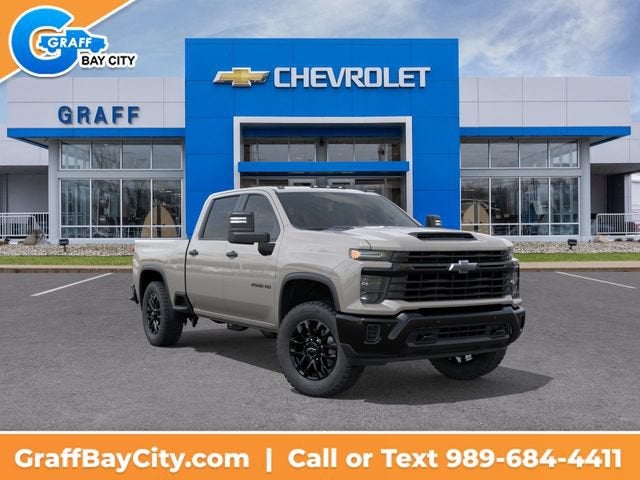 2026 Chevrolet Silverado 2500 HD Custom in White Sands — front three-quarter view